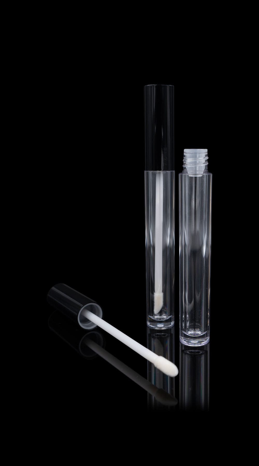 https://www.cosmeticpackagingnow.com/cdn/shop/files/cosmetic-packaging-now-llc-lip-gloss-vibe-pcr-lip-gloss-container-glossy-black-cap-with-clear-bottle-14914457305167.jpg?v=1703744831